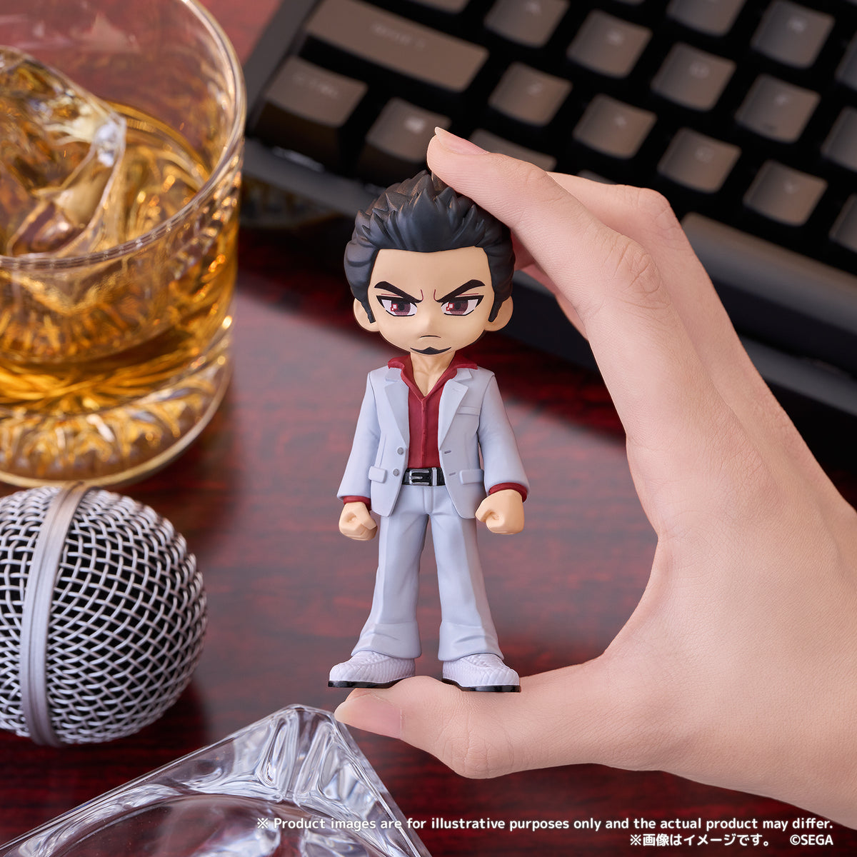 PalVerse Like a Dragon Kazuma Kiryu figure shown in hand for scale